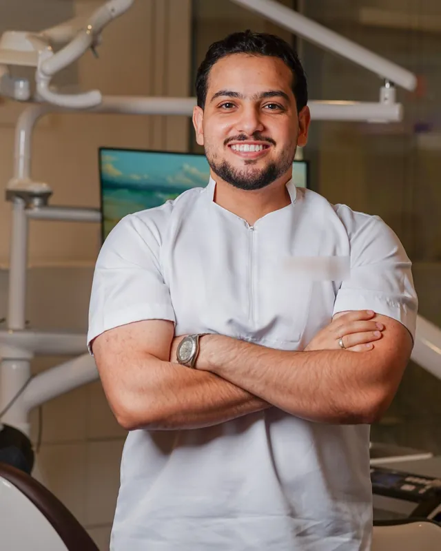 Dr. Omar Haddad smiling in the treatment room